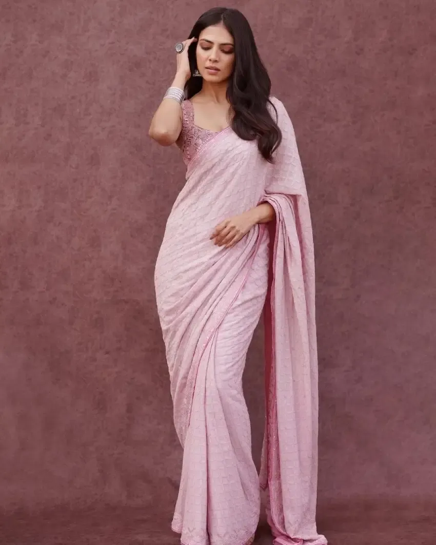 Indian Actress Malavika Mohanan Stills in Sleeveless Pink Saree